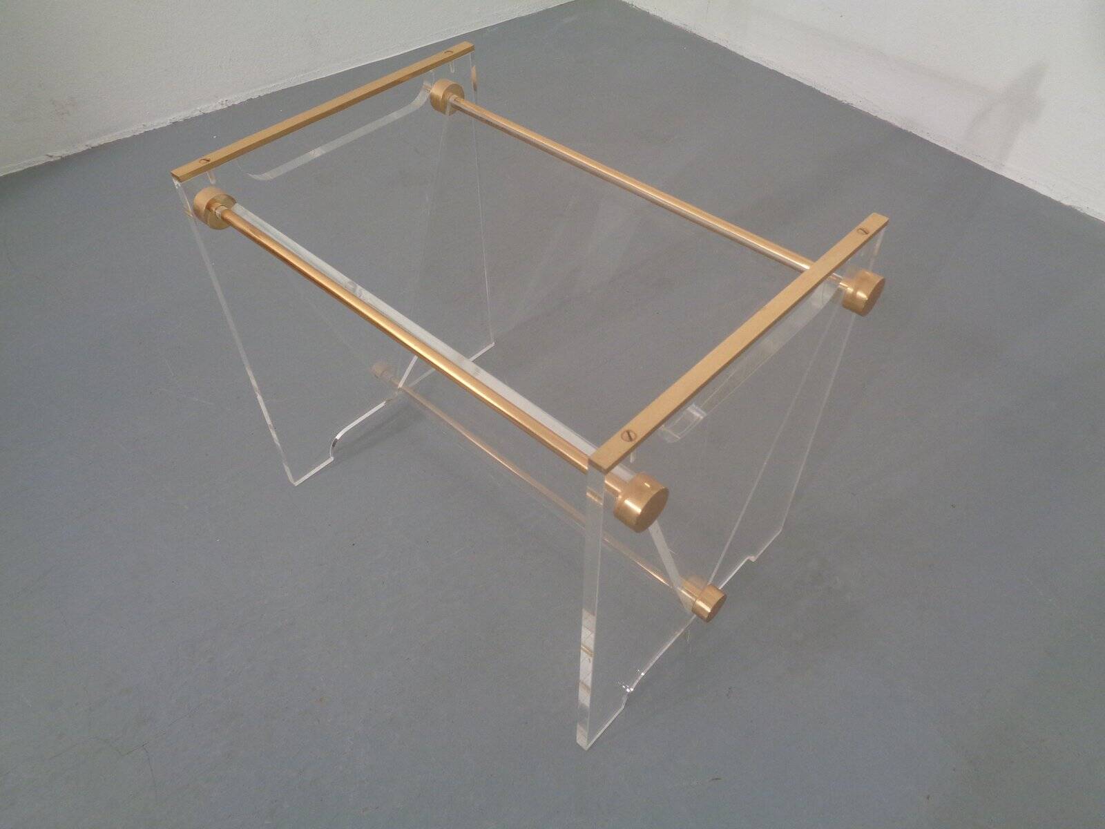 Italian acrylic glass and brass magazine rack, 1970s