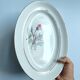 Vintage oval plate signed Moulin des Loups model Imperia pink flower