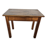 Table basse en noyer massif avec tiroir du début du 20ème siècle