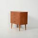 Scandinavian Chest of Drawers in teak with turned birch legs, 1950s