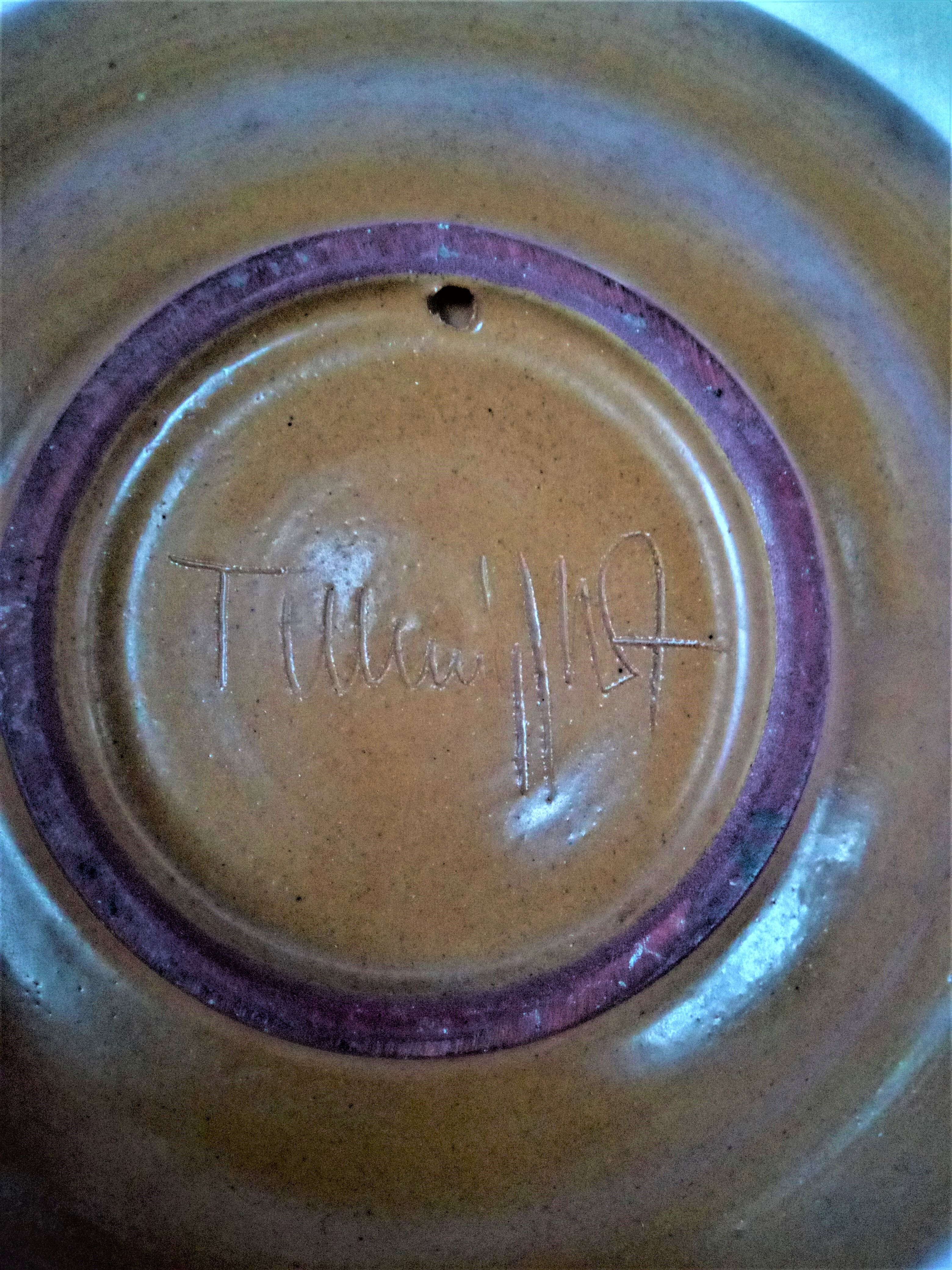 Plate in painted sandstone
