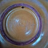 Plate in painted sandstone