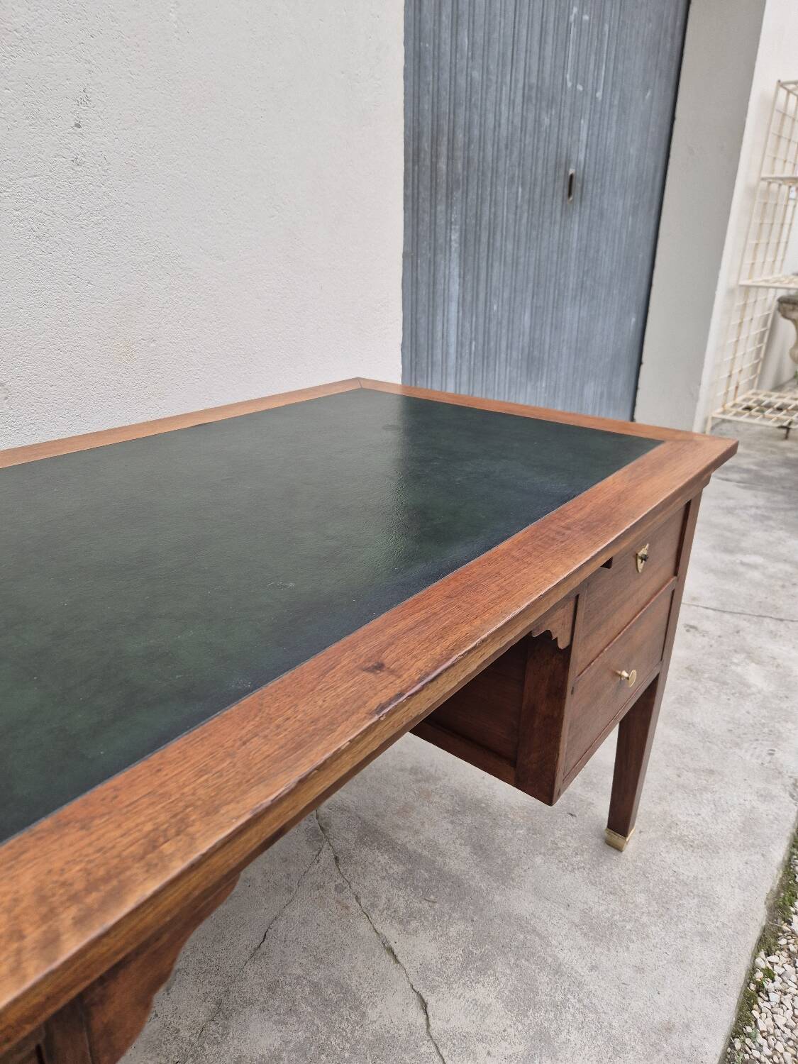 Louis XVI style minister's desk in solid walnut, 4 drawers, old manufacture