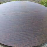 Round table with butterfly extensions