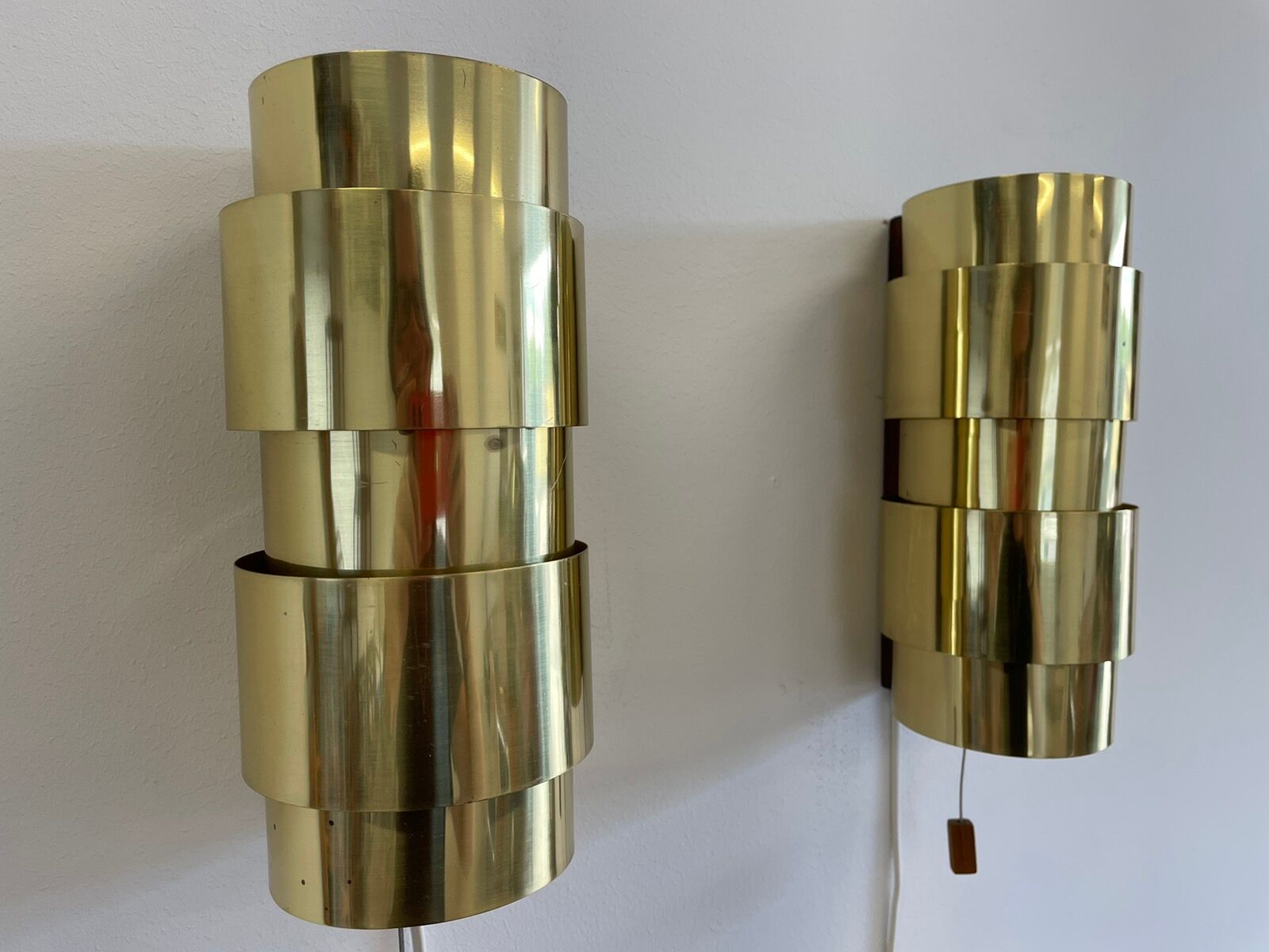 Pair of Scandinavian teak and brass sconces