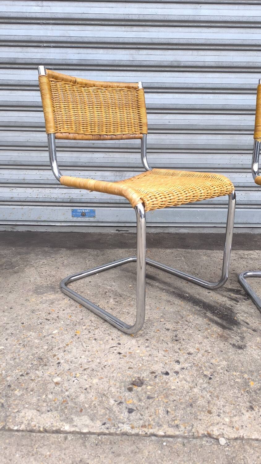 Pair of cantilever and rattan chairs from the 70s