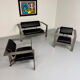 Brutalist living room with faux metal armchairs designed by Karl Friedrich Forster