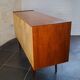 Scandinavian sideboard with sliding doors and drawers - teak