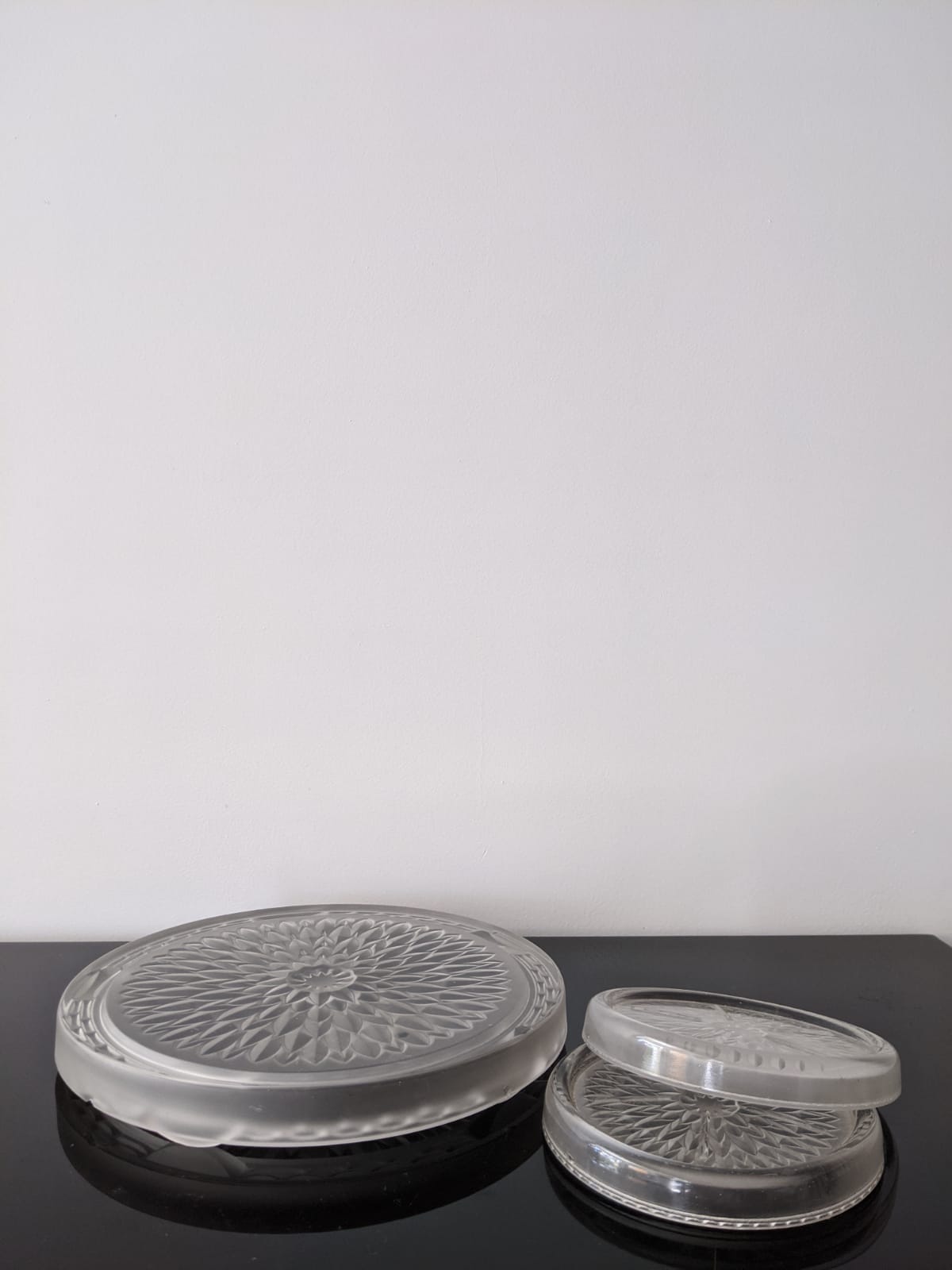 Under the plate and engraved glass bottle bottoms