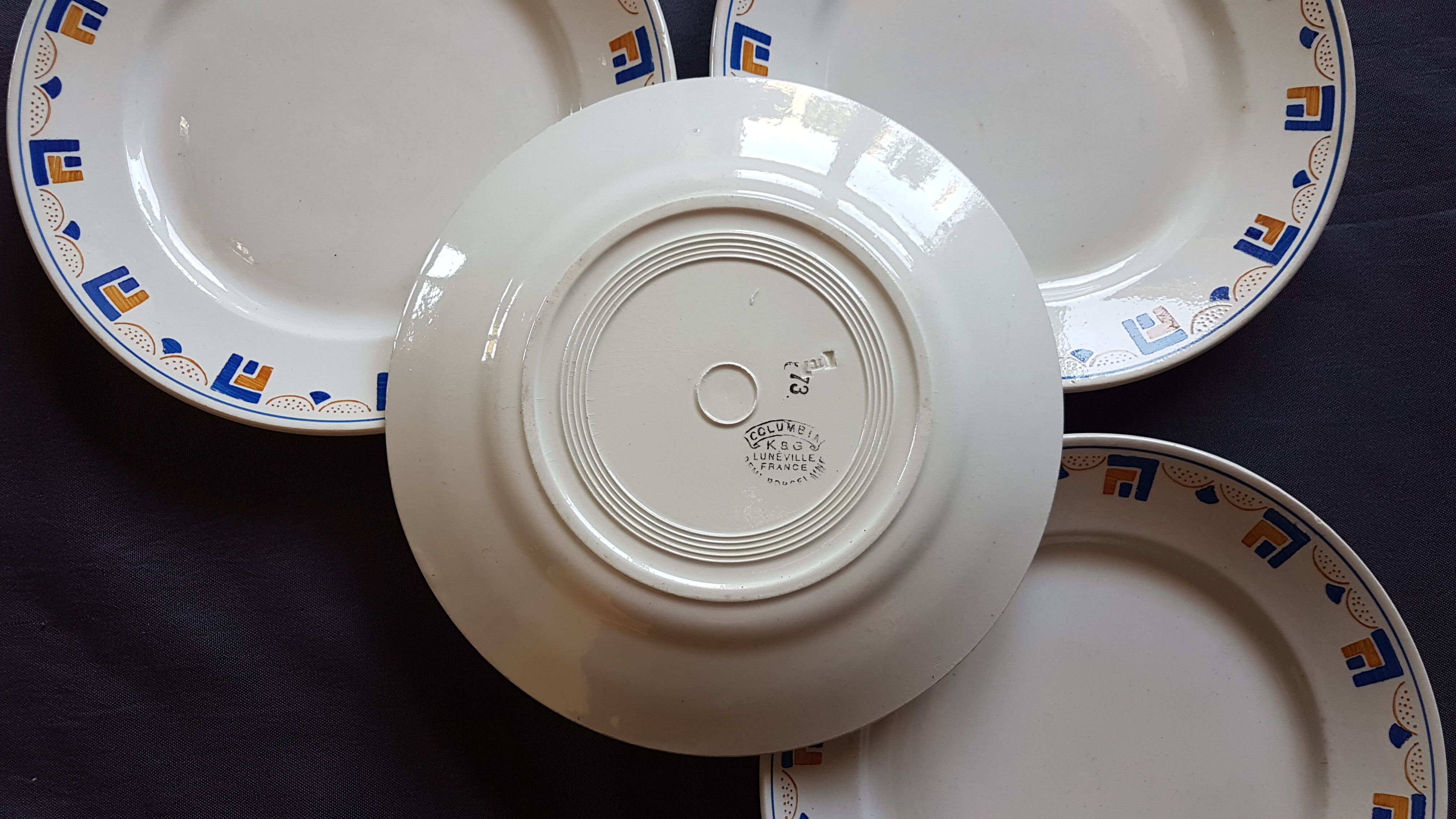 Suite of 4 plates made of Lunéville earthenware