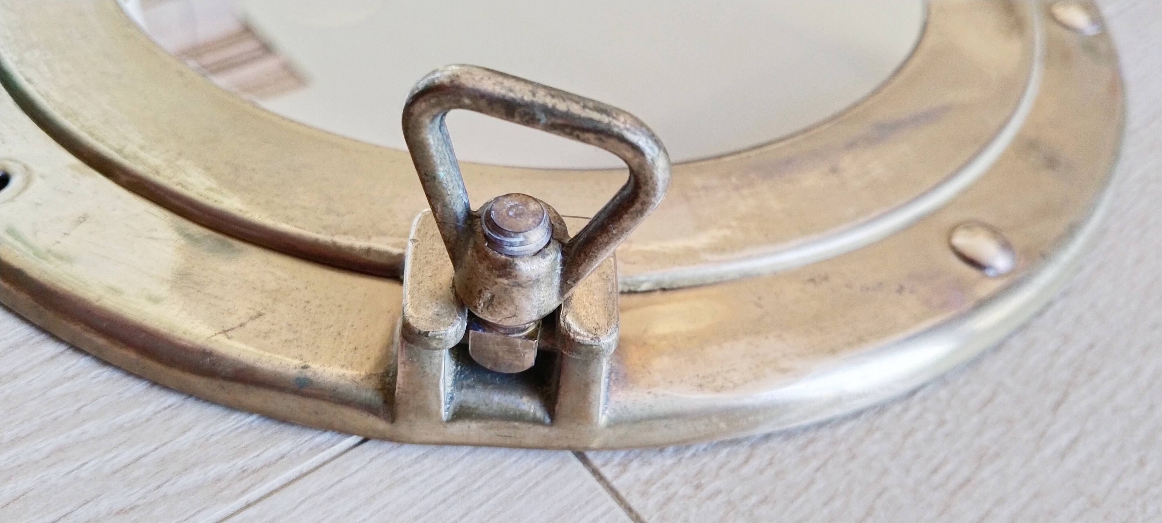 Porthole mirror in gilded brass, marine mirror