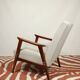 Vintage light gray armchair dark wood Scandinavian design 1970