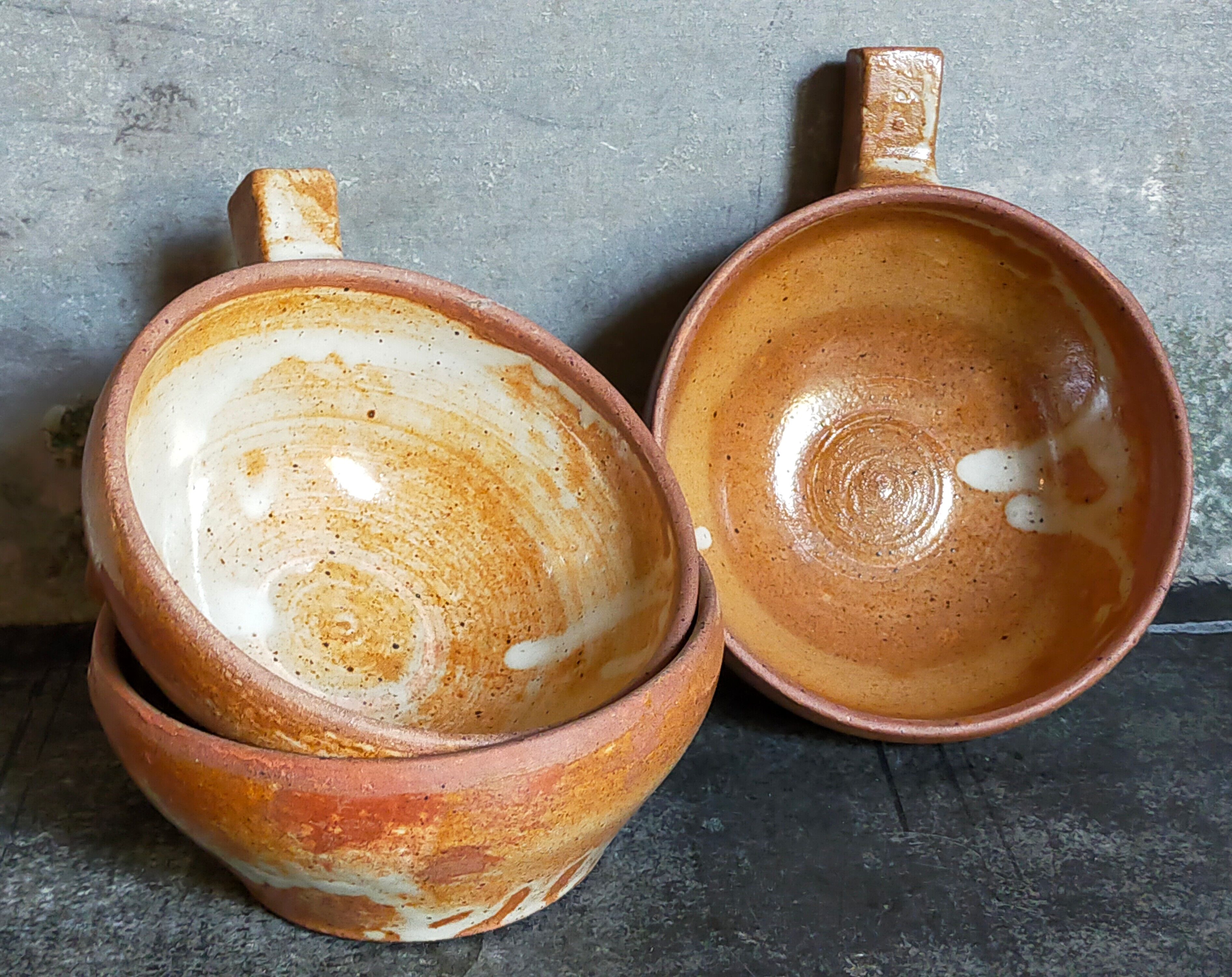 Three vintage marais sandstone bowls