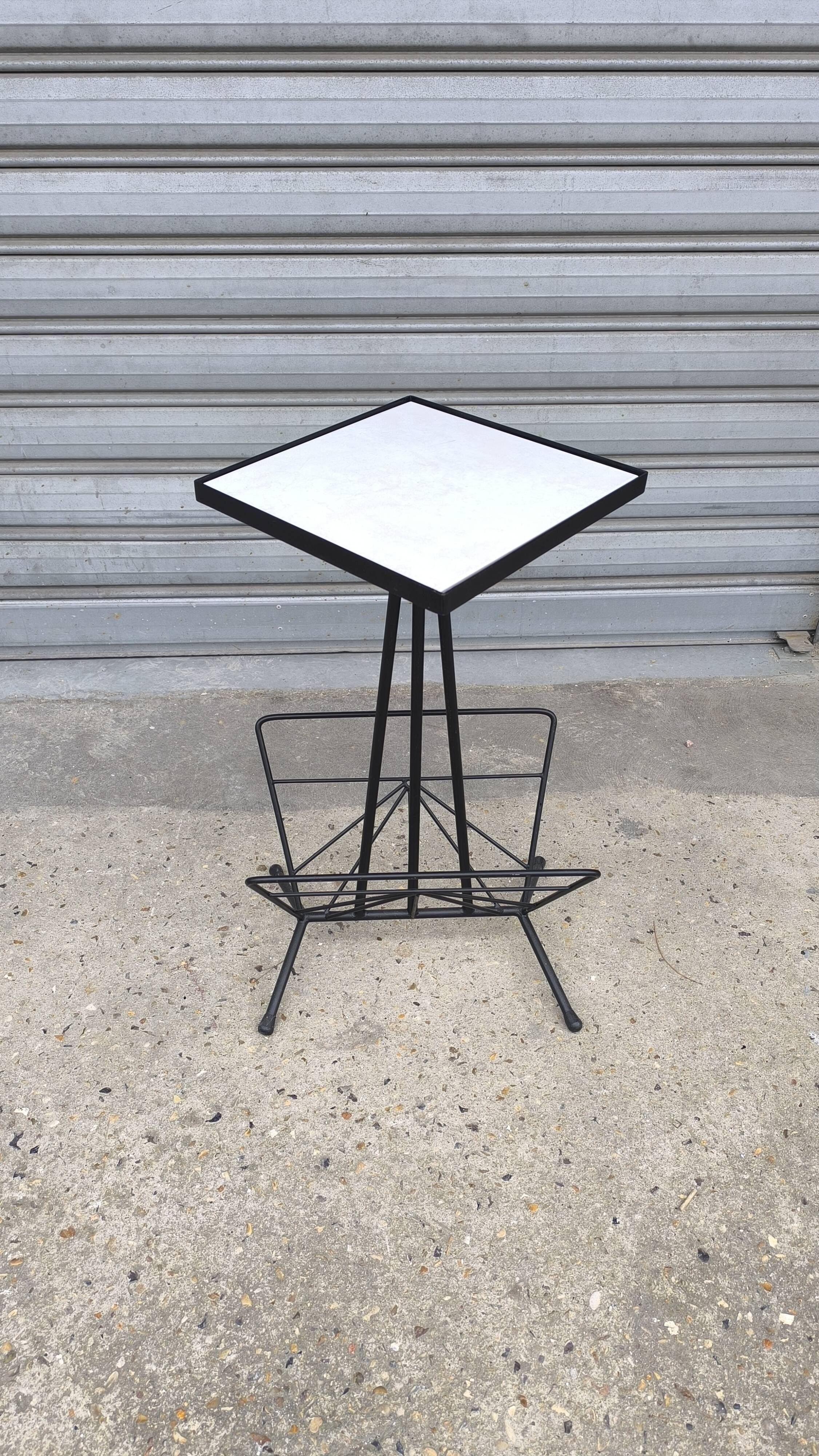 Iron and earthenware magazine rack, 1970