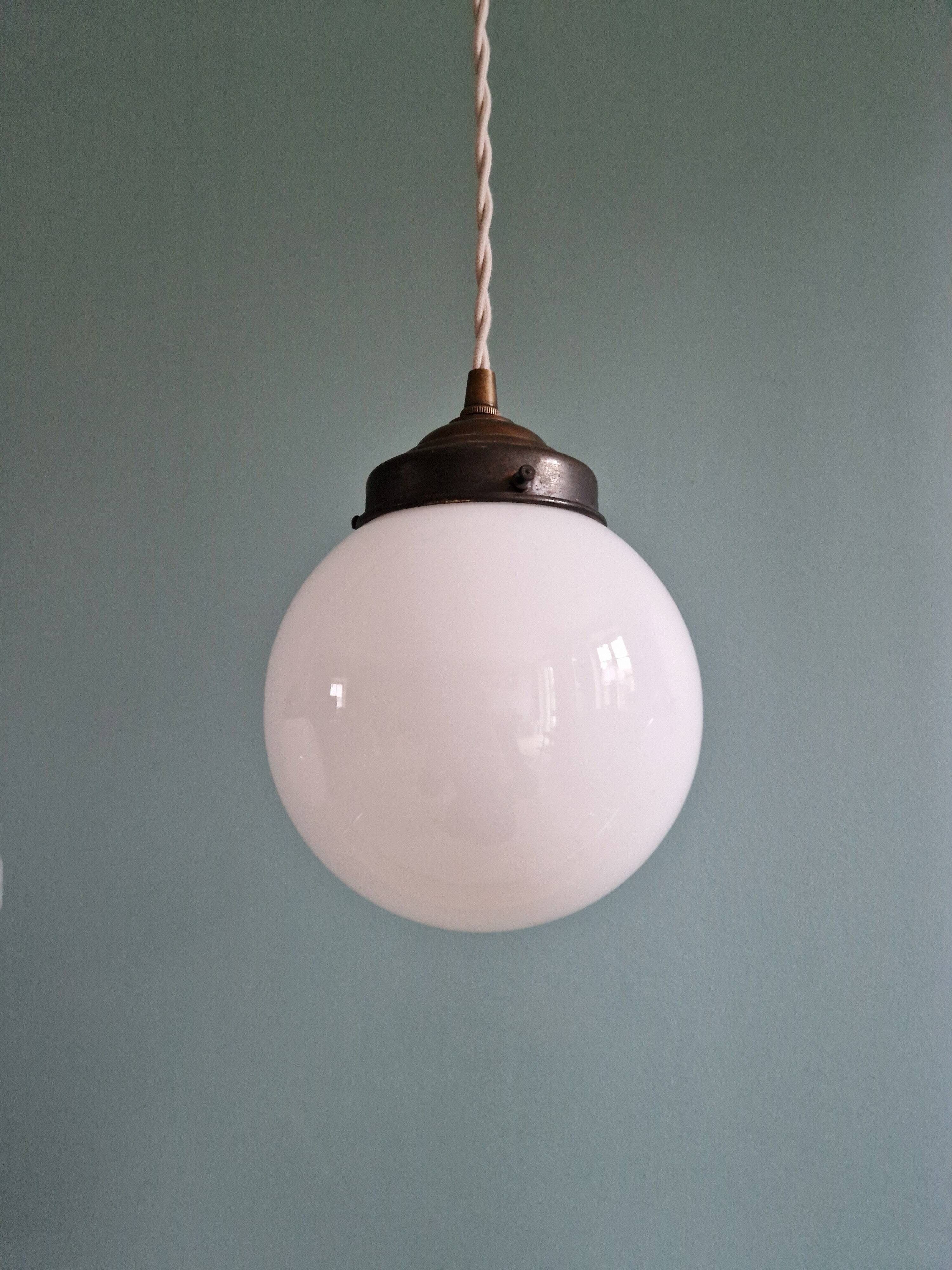 Art Deco trio of suspensions in white opaline, 1930s