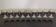 9 white wine glasses on vintage Luminarc smoked black stem