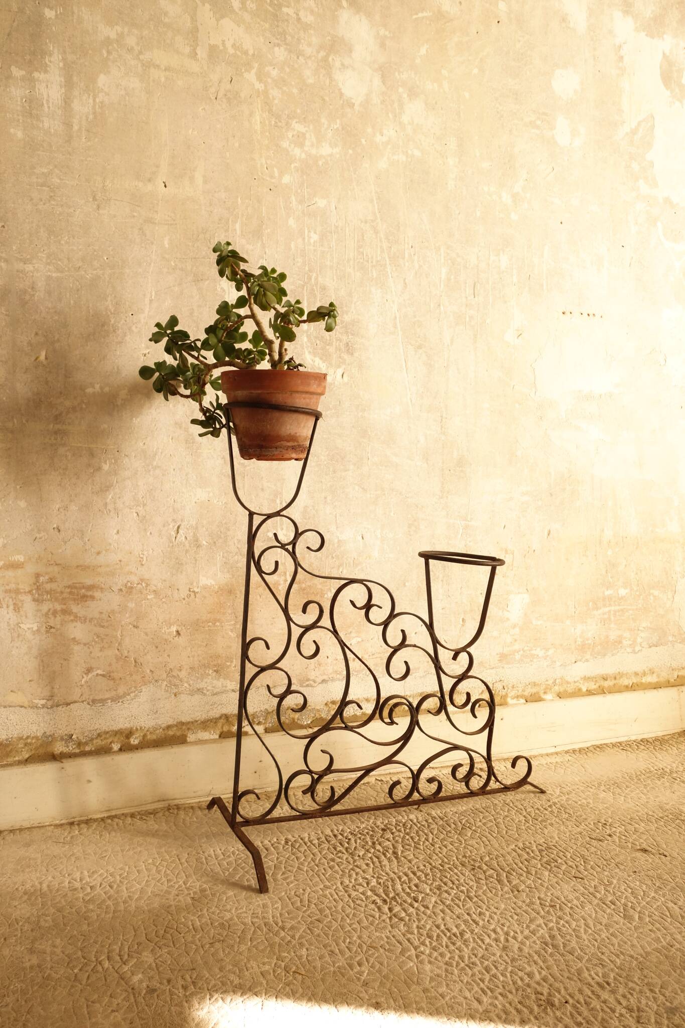 Antique wrought iron plant stand