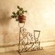 Porte-plantes ancien en fer forgé