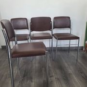 Set of 4 brown leatherette armchair chairs from the 1970s