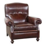 Fauteuil anglais ancien en cuir de mouton