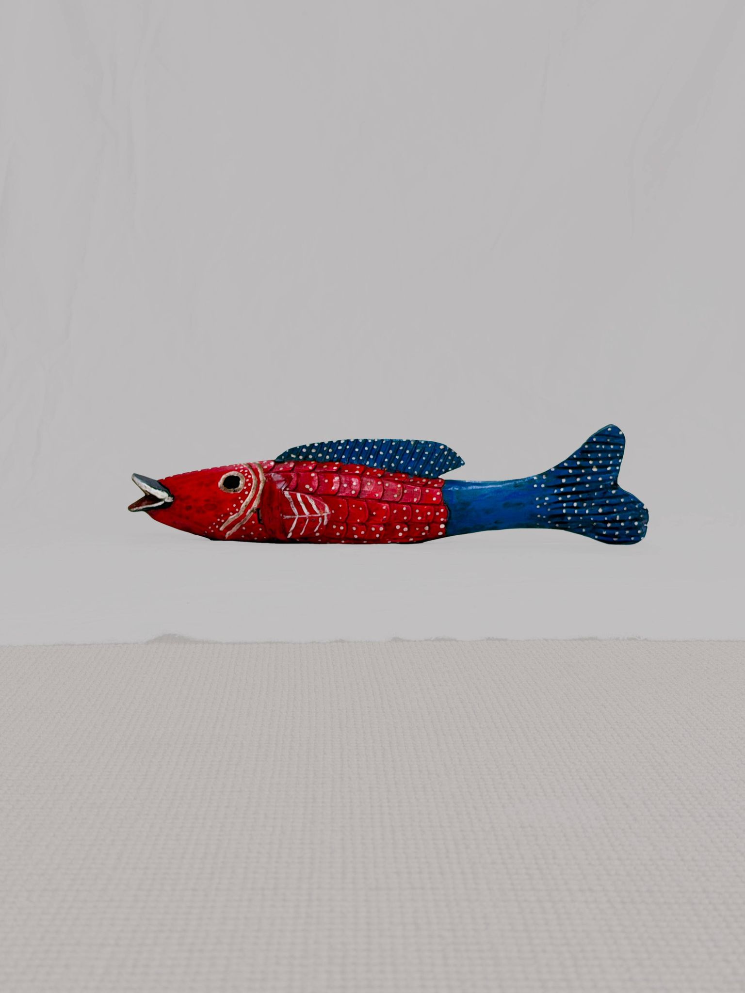 Poisson Bozo rouge et bleu en bois  (Mali)