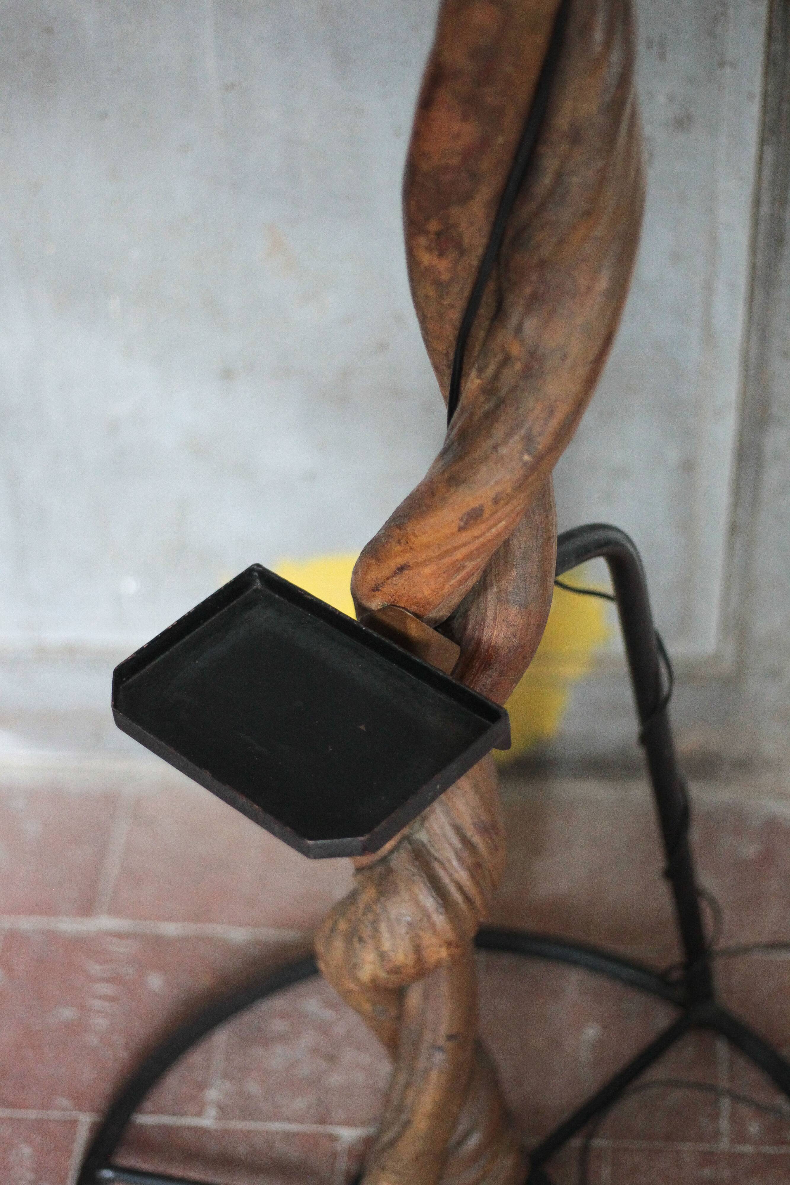 Liane and metal floor lamp with perforated leather shade featuring elephant patterns, lise.