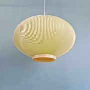 Vintage oval-shaped suspension in pleated celluloid, light green colour, 1960.