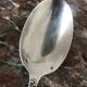 Set of 7 tablespoons in flowered silver metal with punch