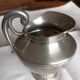 Shiny pewter tea set