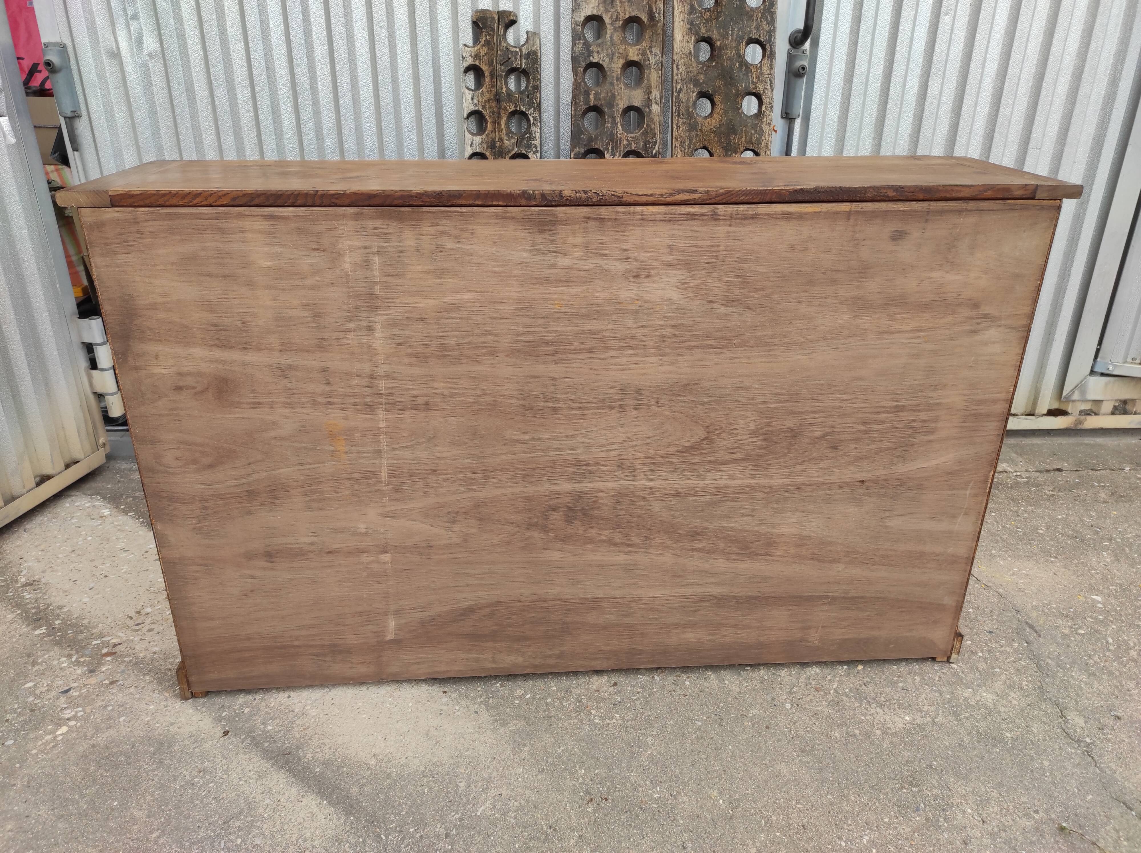 Trade furniture with 12 drawers in gilded oak