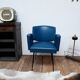 Fauteuil vintage en skaï et pieds métal