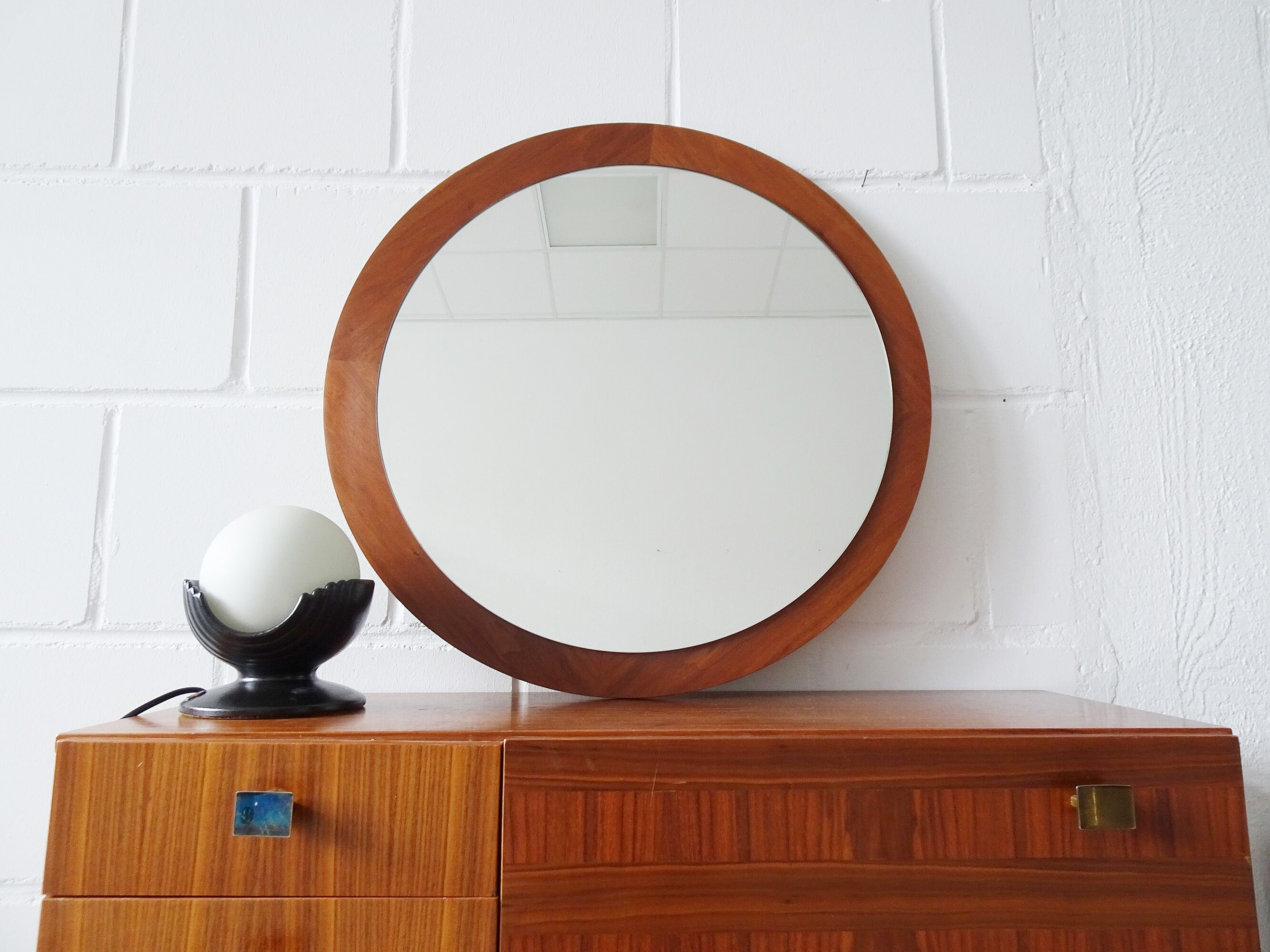 round teak mirror