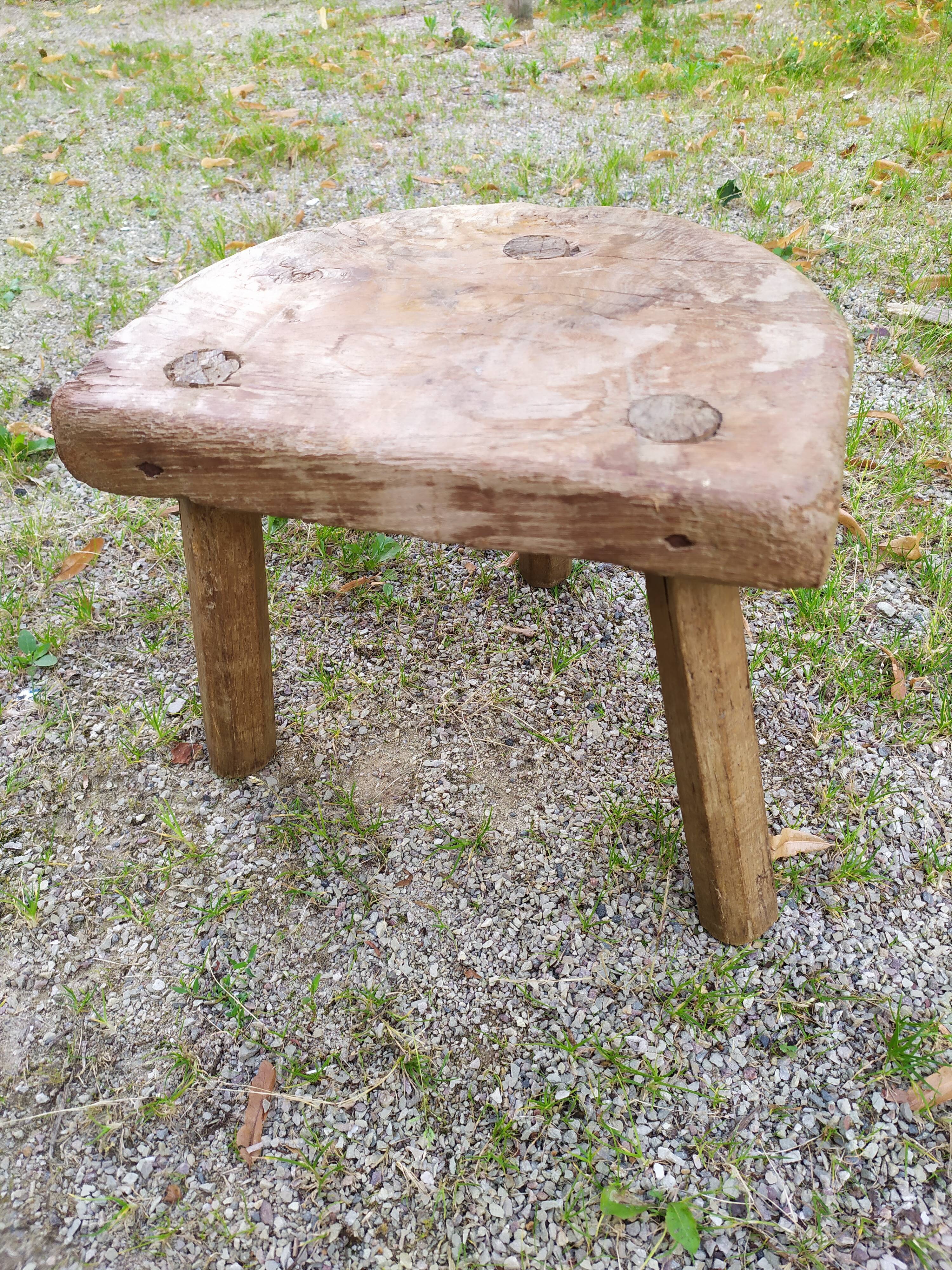 Tripod stool in raw wood