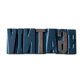 Old wooden printing letter