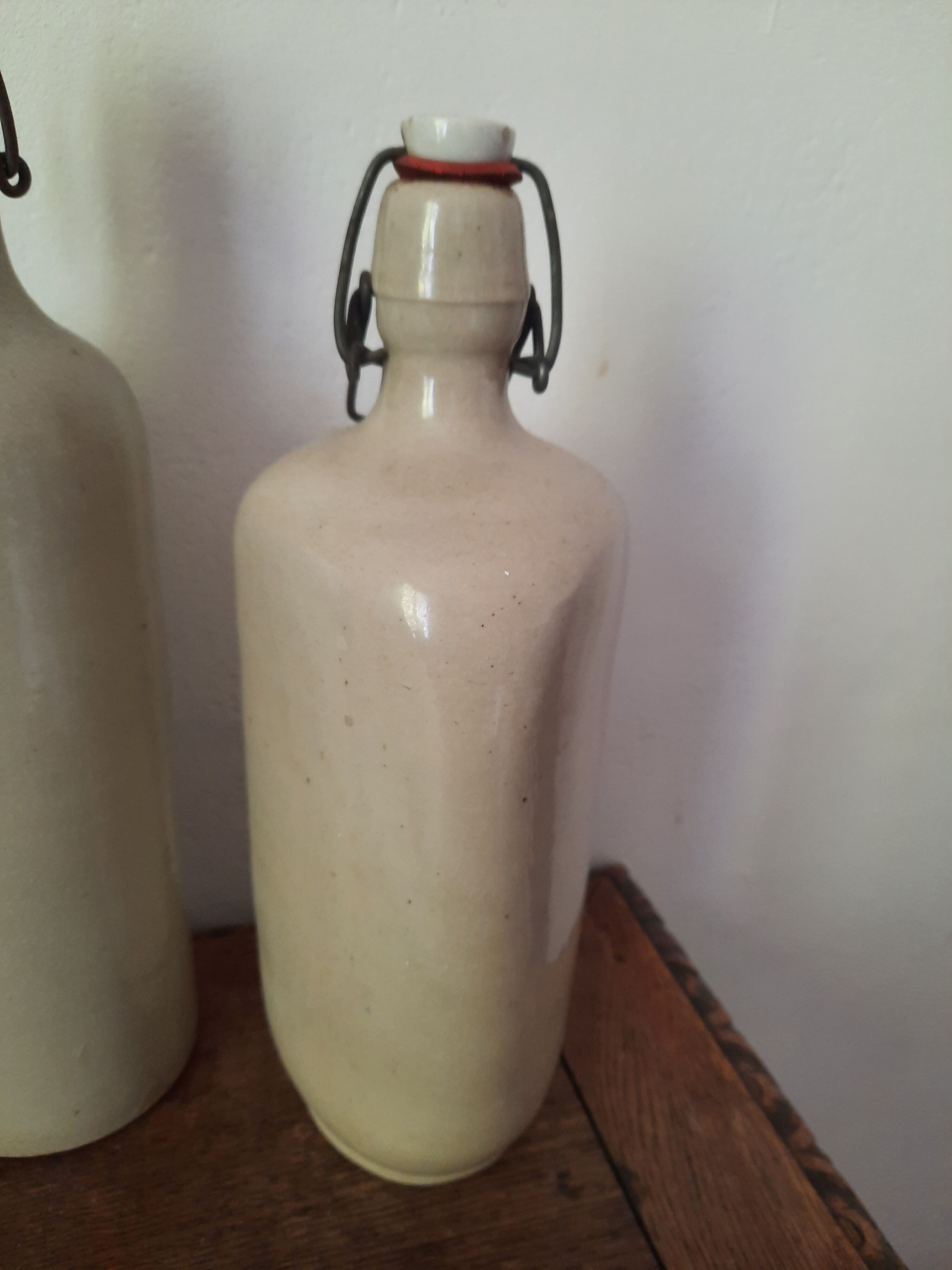 Pair of sandstone bottles