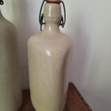 Pair of sandstone bottles