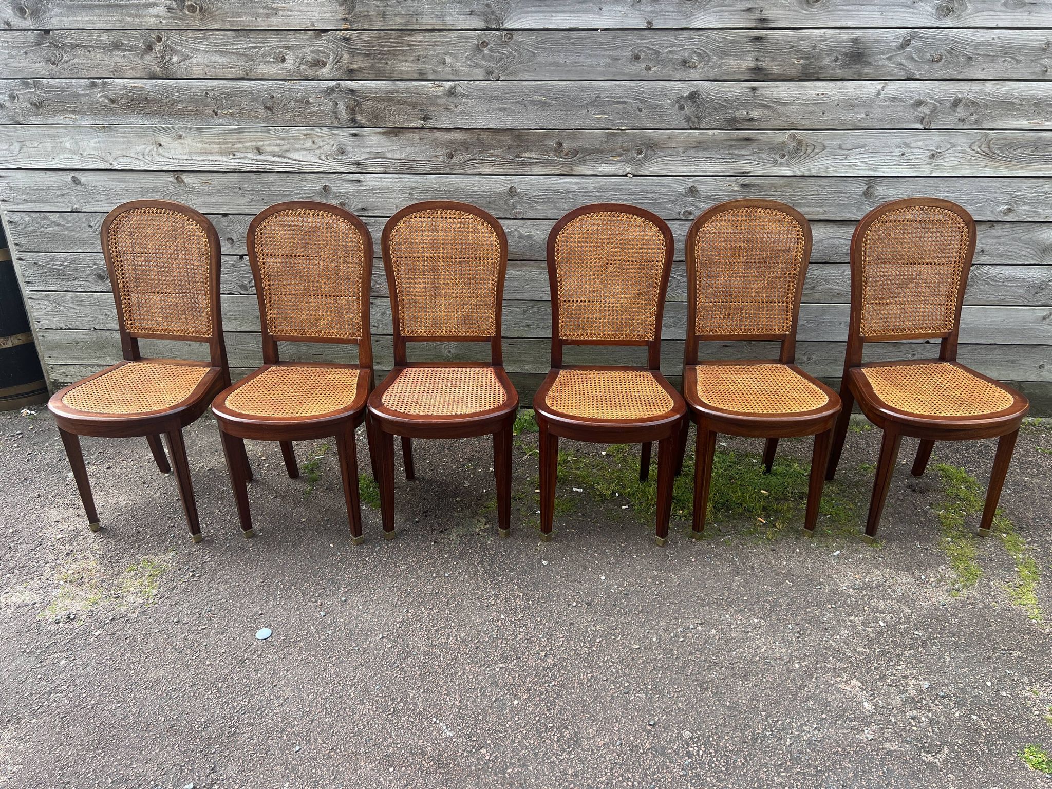 Six caned mahogany chairs, Art Deco, 20th century.