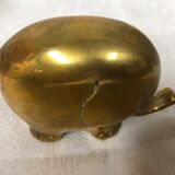 70s golden brass elephant paper press