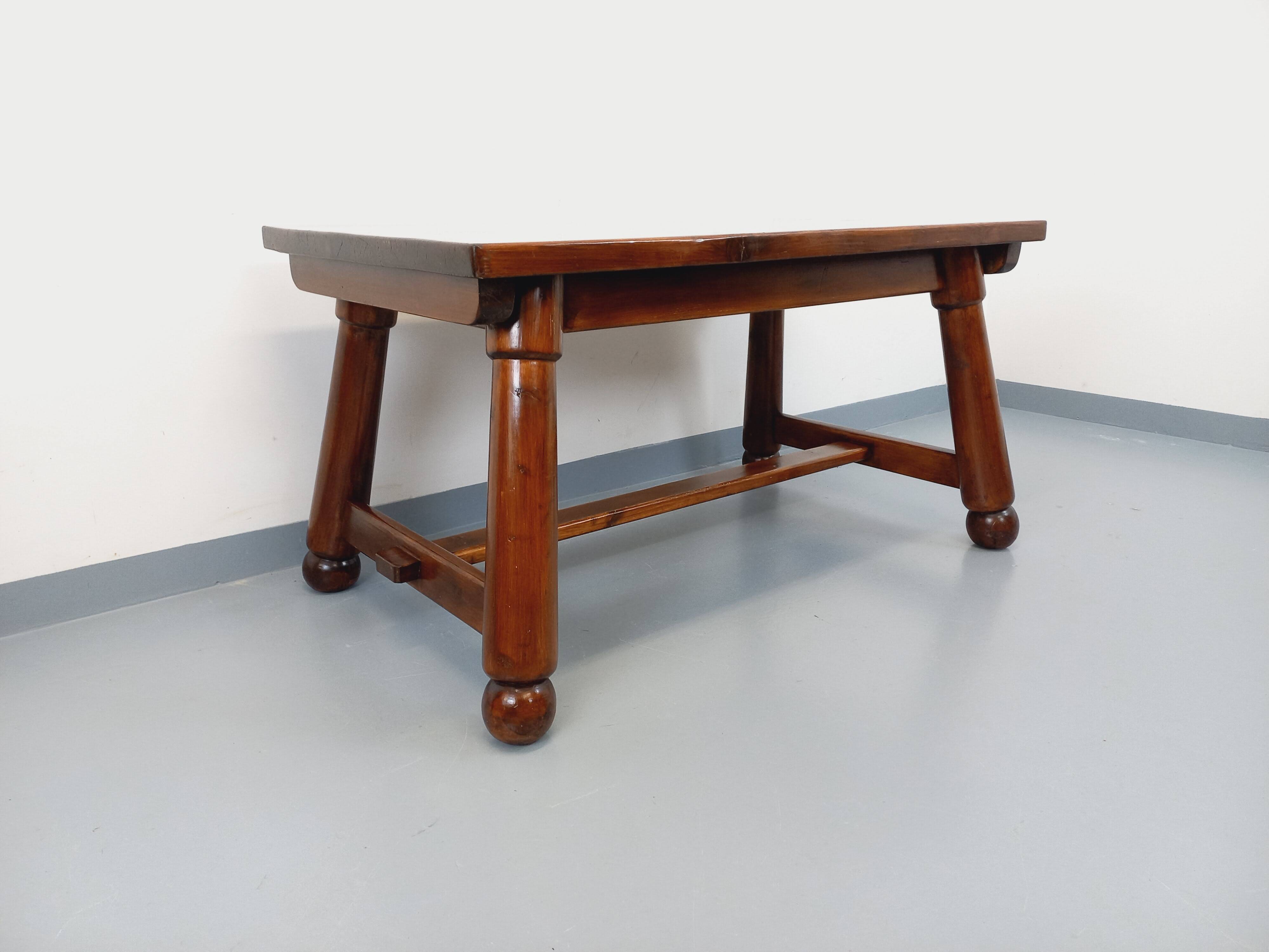 Brutalist rectangular dining table by Georges Robert in pine wood.