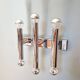 Tubular wall light in chromed metal