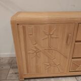 Vintage wicker sideboard with flowers
