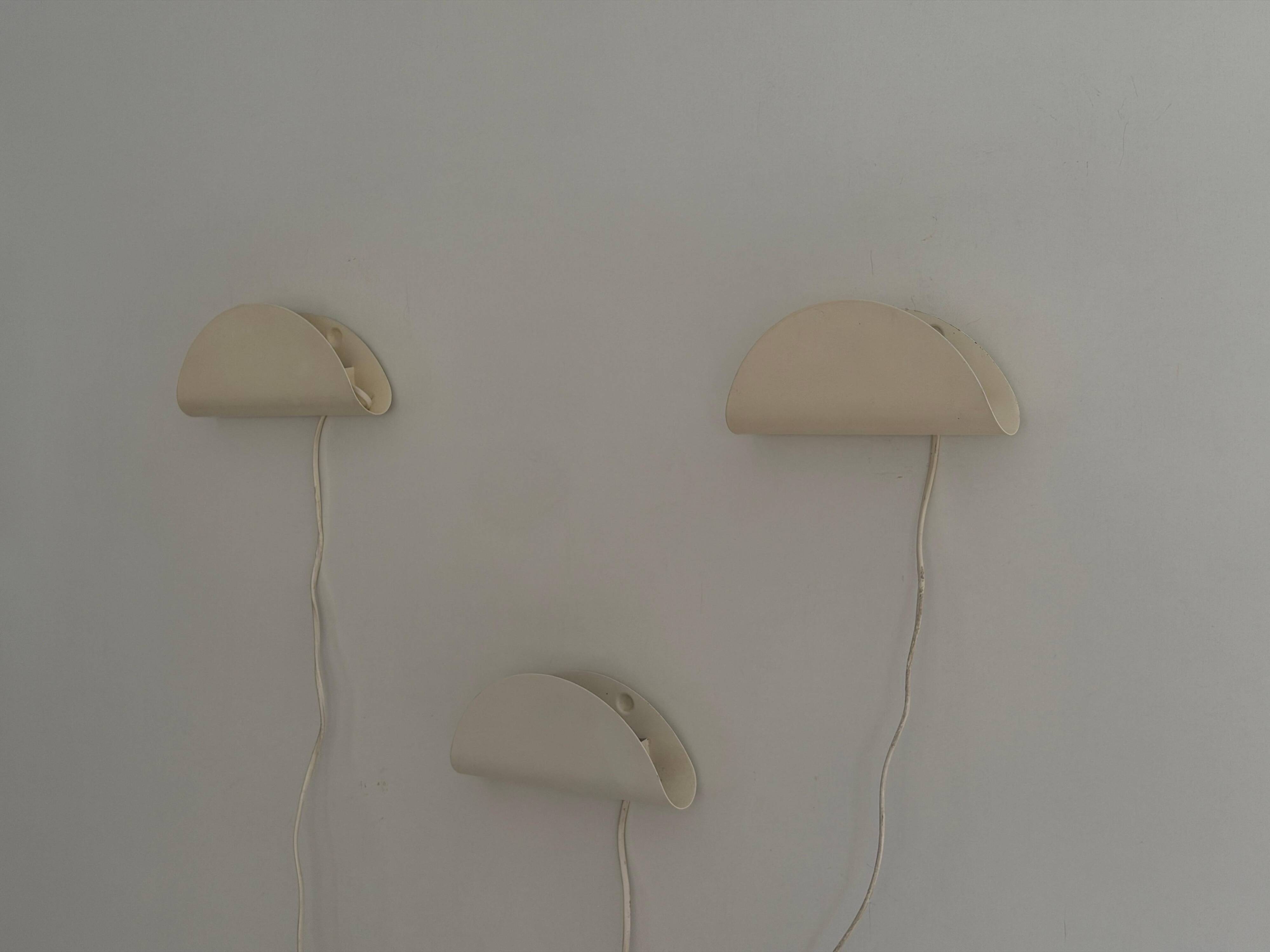 Set of three cream metal wall lights by Nordlux, 1980s, Sweden.