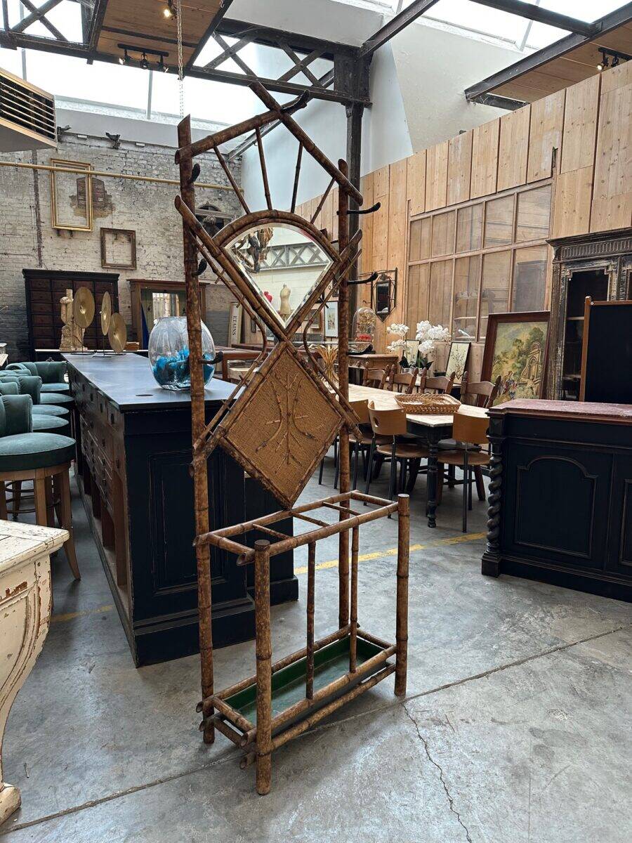 Entrance hall wardrobe in bamboo and rattan from the early 20th century.