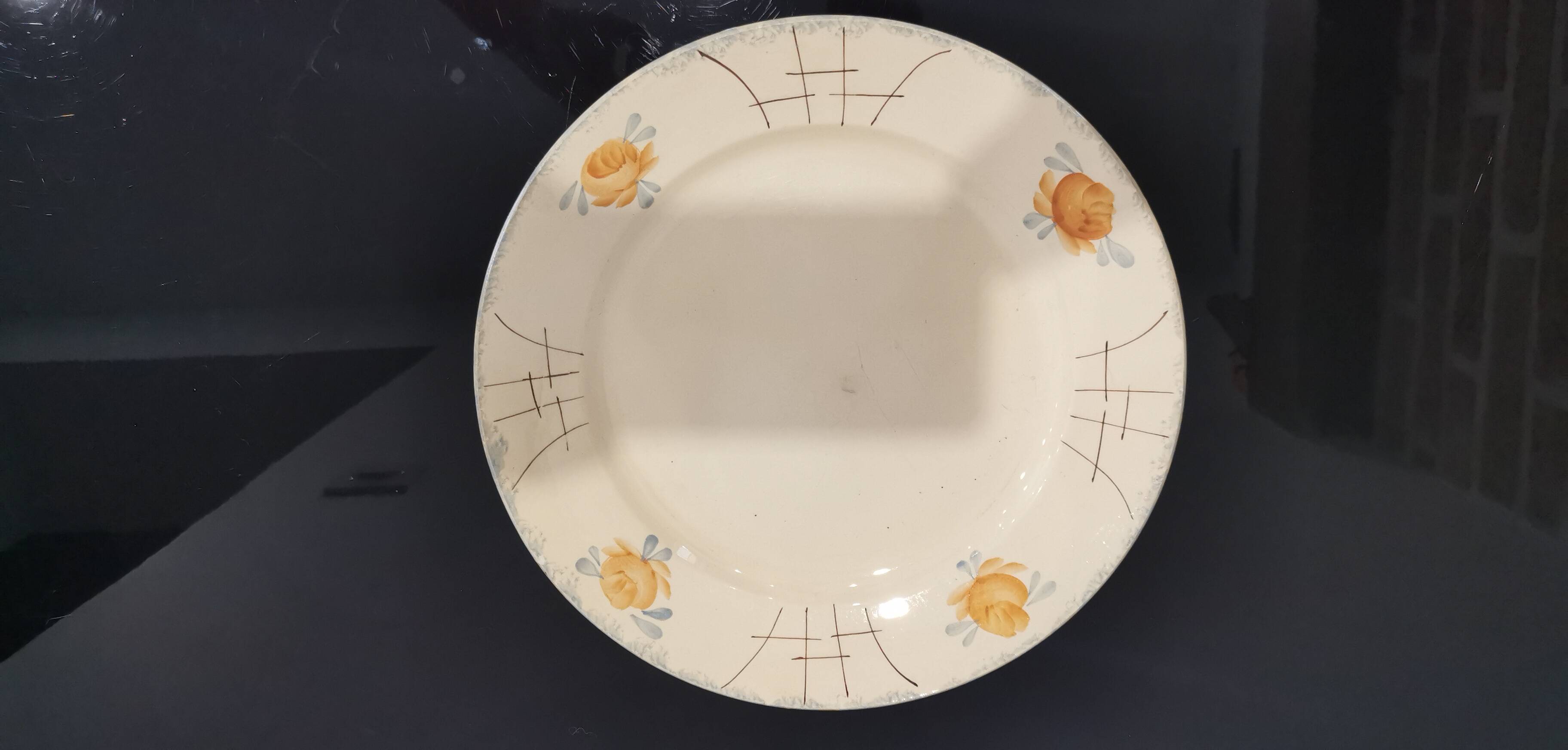 Old Terre de fer earthenware dish, hand painted