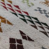 White carpet with multicolored Berber patterns handmade