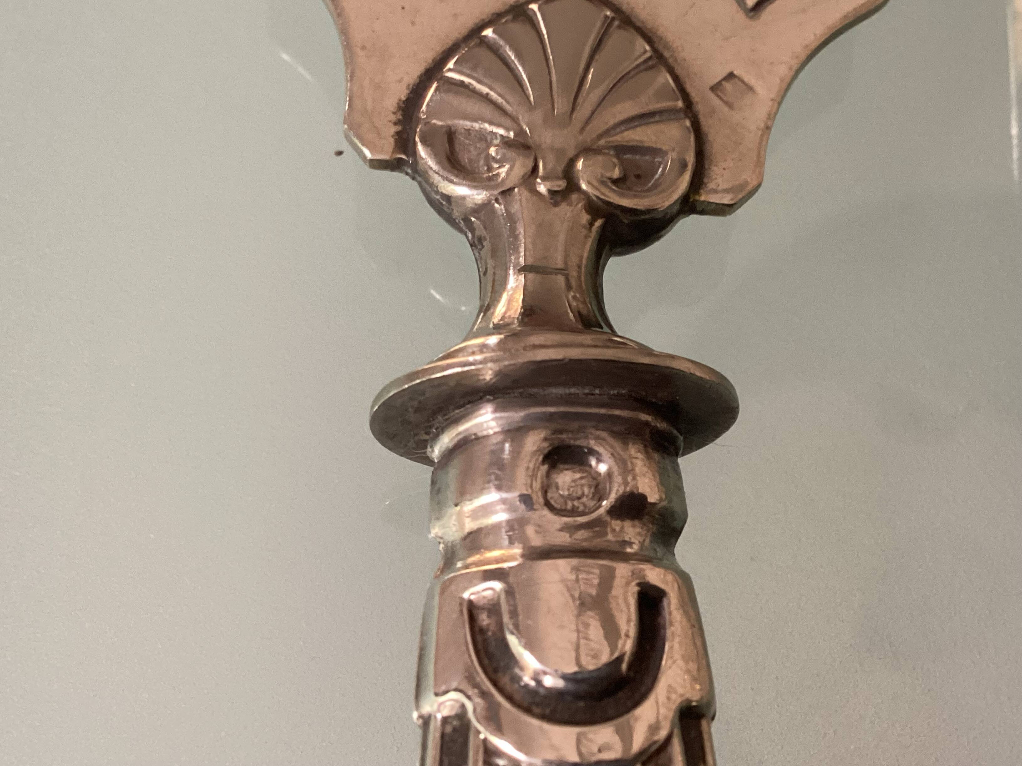 Antique silver serving cutlery with a Minerva hallmark.