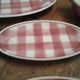 1 oval dish, 1 round dish, 2 raviers, 1 sausage