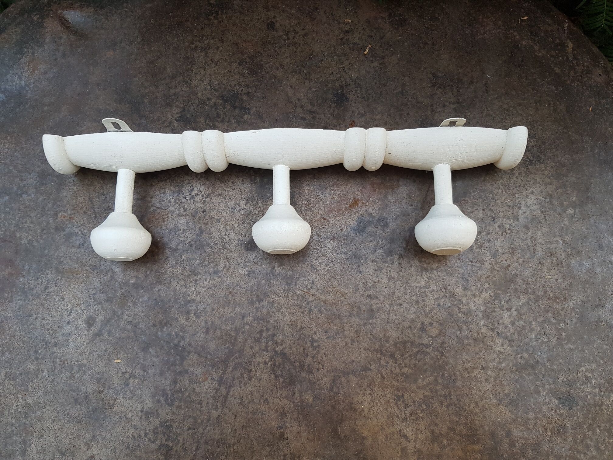 White wooden wall coat rack