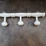 White wooden wall coat rack
