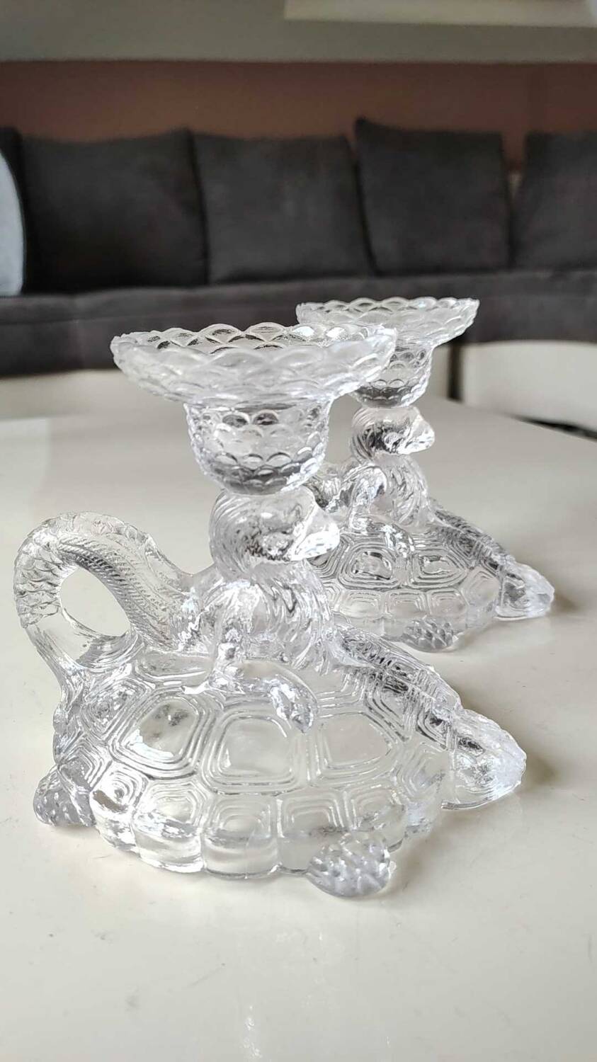 Pair of hand candlesticks/glassware from Portieux/Vallerysthal. In molded glass. Zoomorphic form of turtle carrying a griffin on its back.